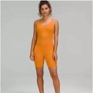 Size 2 bodysuit. Used twice and it was too tight